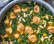 Hearty greens and meatball soup